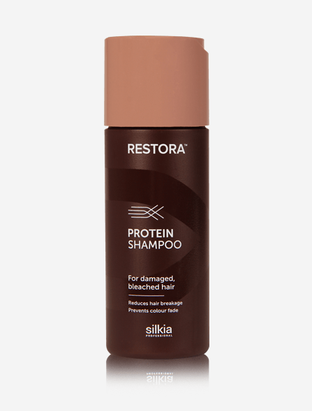 Restora Protein Shampoo instantly hydrates and revives damaged and bleached hair.